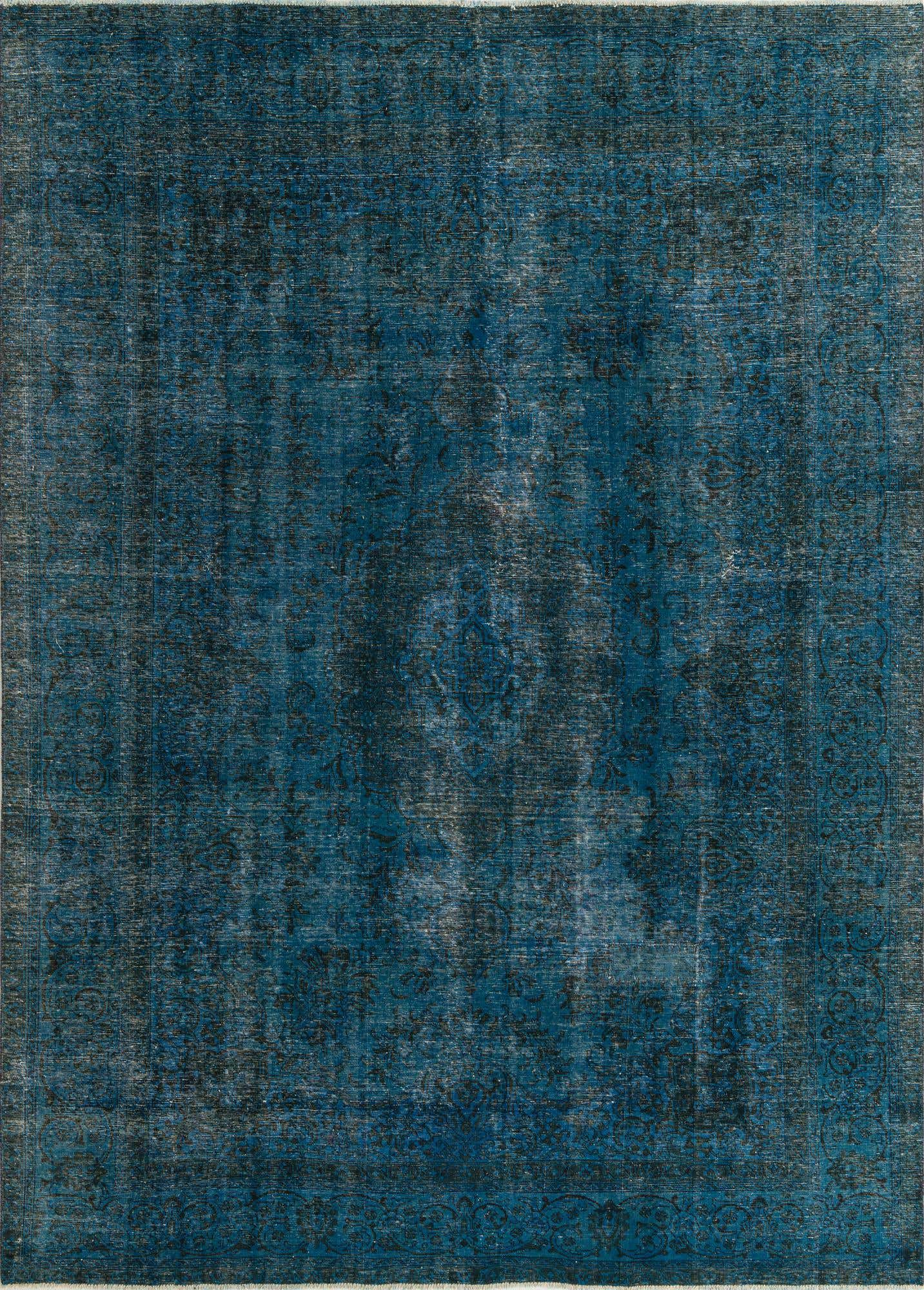 A 9x12 rectangular Ultra Vintage rug in varying shades of blue, featuring a distressed Persian medallion pattern.