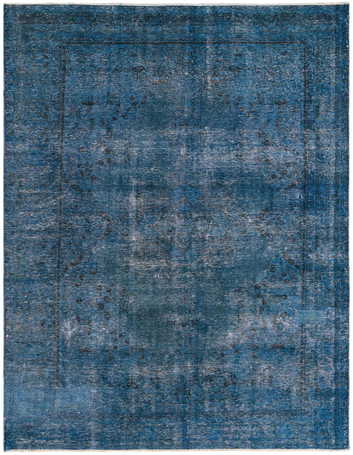 A 7x10 rectangular blue wool rug with a distressed Persian medallion pattern and a flat pile, perfect for a living room.