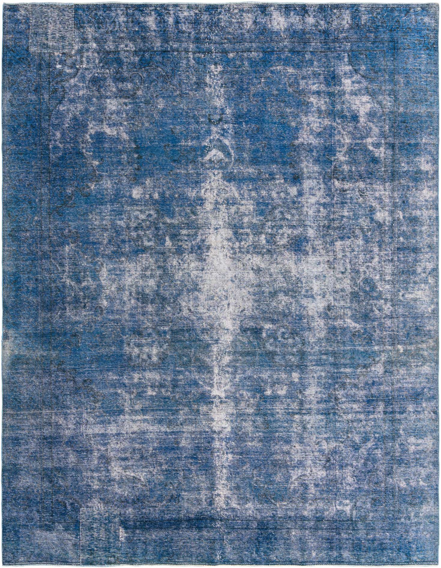 A large 9x12 rectangular Ultra Vintage rug in varying shades of blue with a distressed Persian medallion pattern.