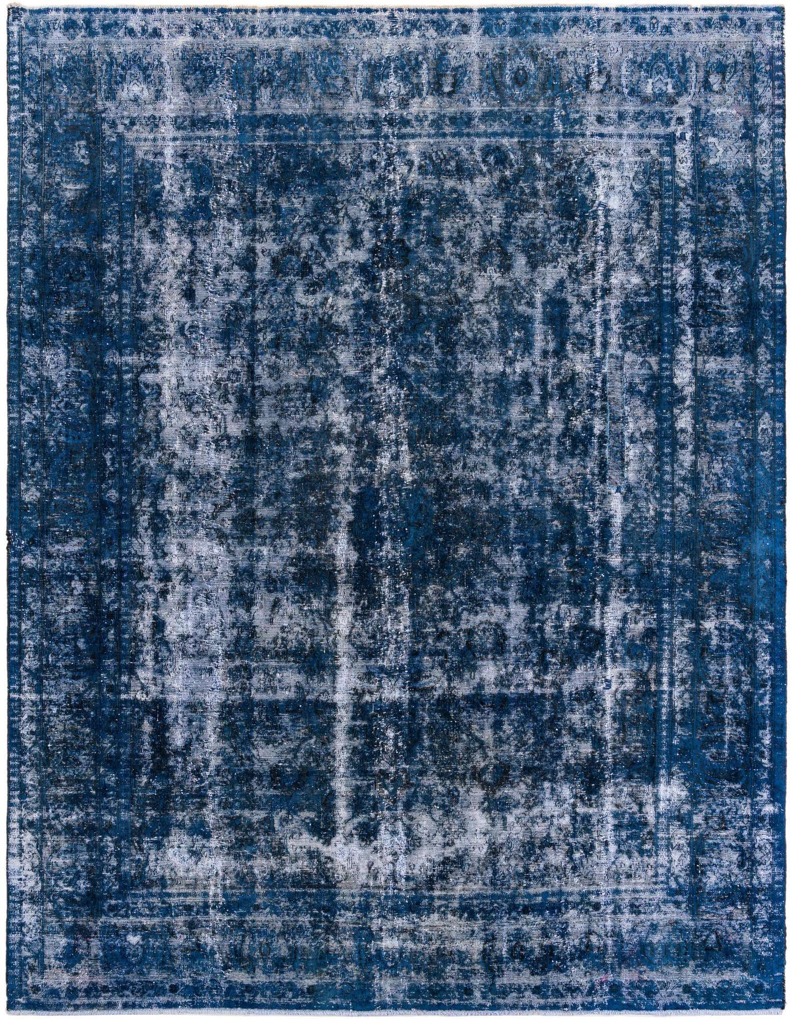A large 10x12 rectangular indoor rug featuring a distressed blue Persian medallion pattern with faded white accents.