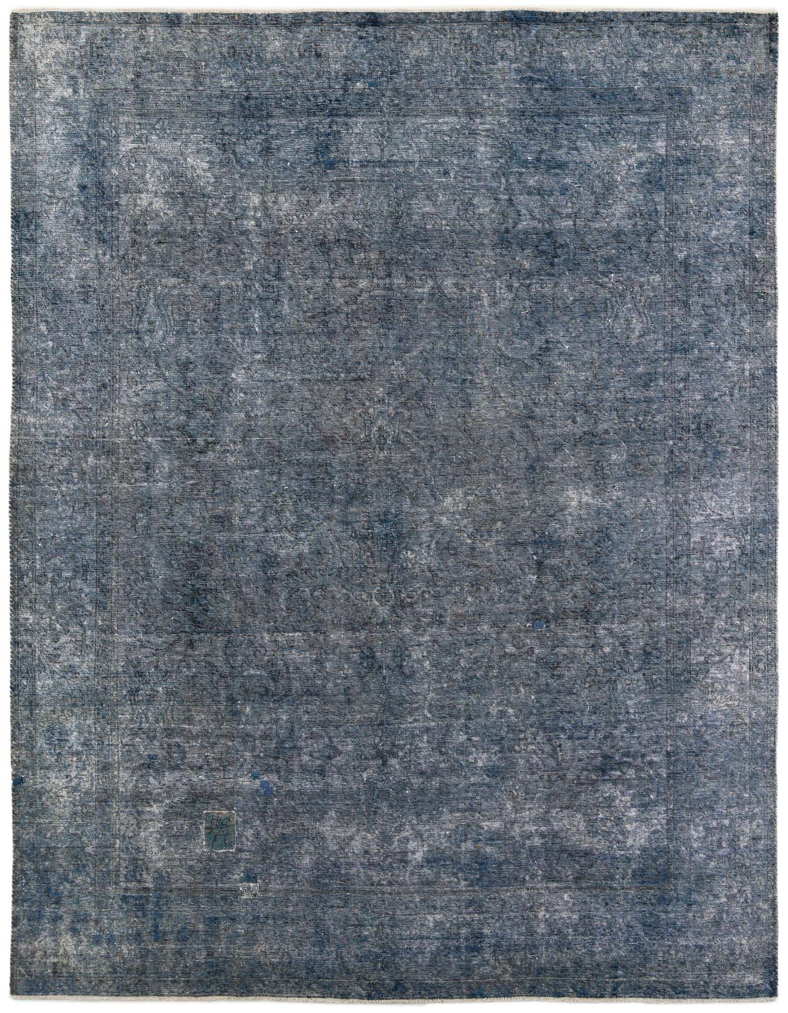 A 9x11 rectangular Ultra Vintage wool rug in varying shades of blue with a distressed Persian medallion pattern.