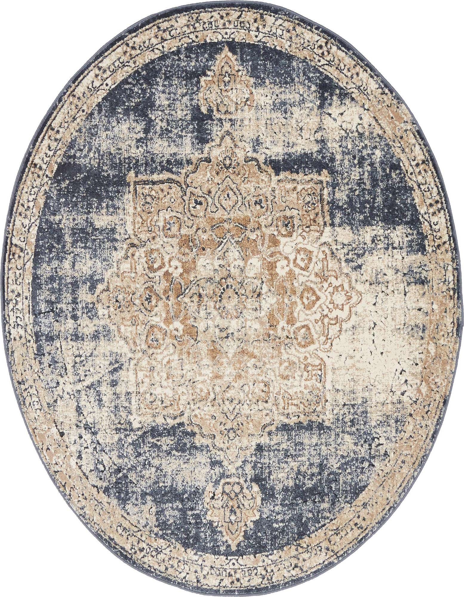 A 4' round Eliza rug in blue and beige, featuring a distressed traditional medallion pattern with a textured pile.