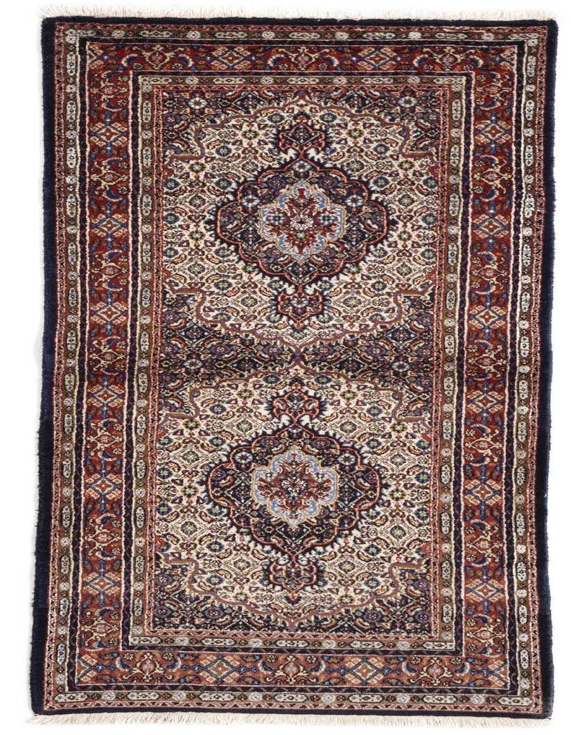 A 7 ft runner rug in a traditional Persian style, featuring intricate blue, red, and cream patterns with a dark border.