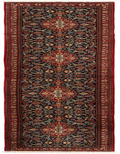 A 13 ft runner rug in a traditional Persian style, featuring a dark blue field with intricate red, gold, and light blue floral patterns, bordered by a rich red band.