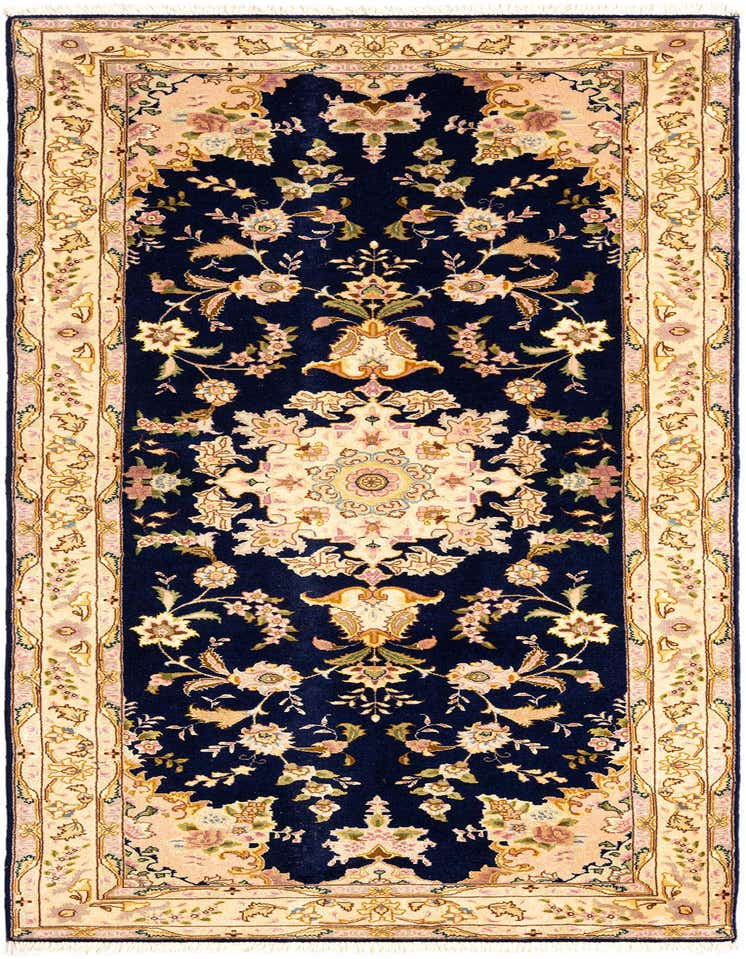 A handmade 7 ft runner rug featuring a detailed Persian floral pattern in navy blue, cream, and pink.