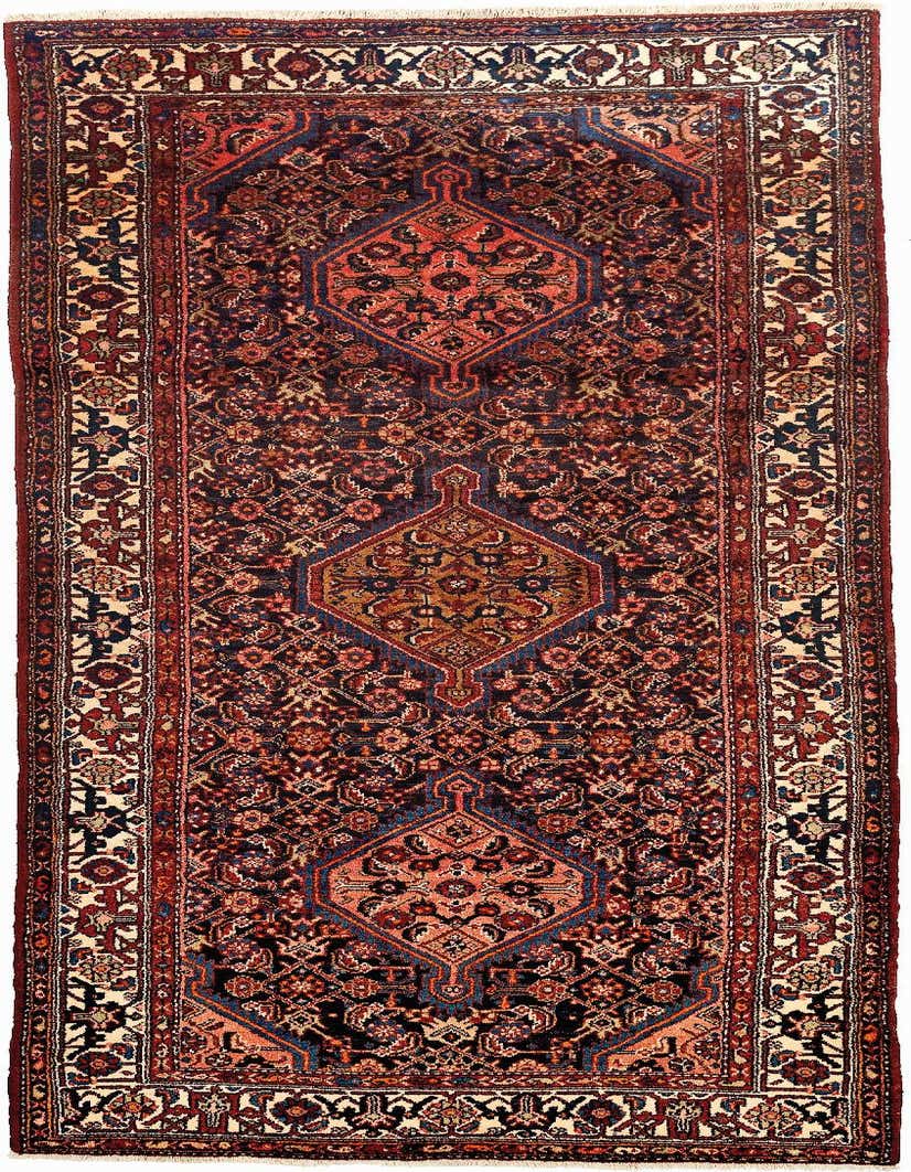 A 10 ft runner rug in traditional Persian style, featuring a deep blue field with intricate red, orange, and cream medallion patterns, ideal for a hallway.