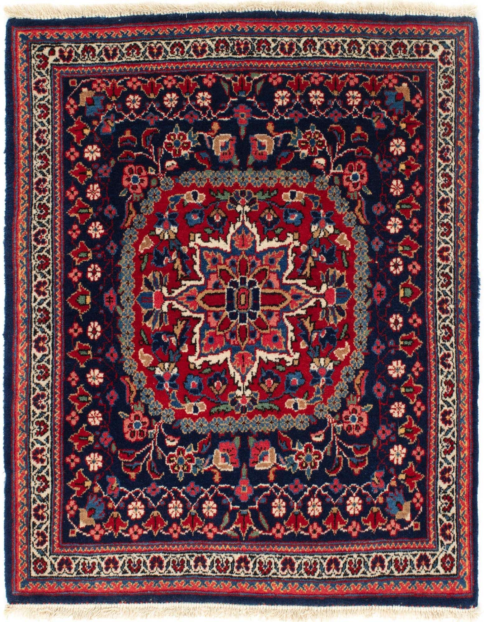 A 2'x2' square Persian wool rug with a central red medallion and intricate floral patterns on a deep blue background.