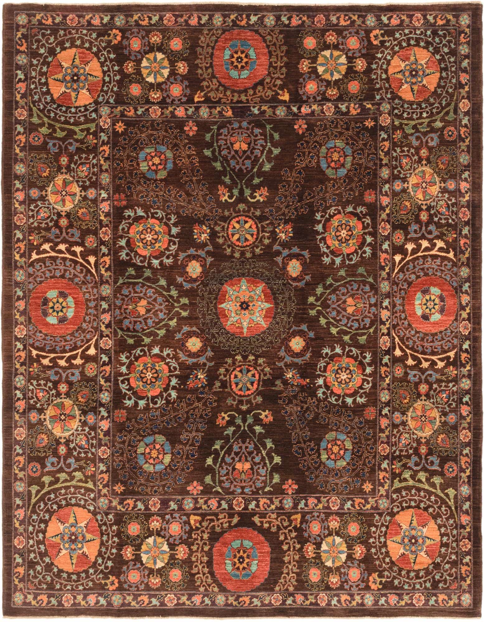 A 7x10 rectangular Ariana Ziegler rug featuring a rich brown background with intricate traditional tribal patterns in orange, blue, and green.