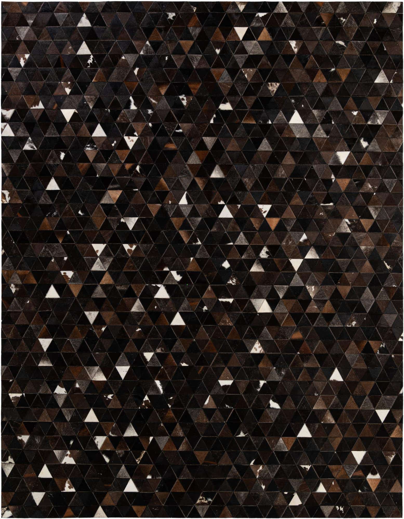 A rectangular 8x10 Cowhide Patchwork rug featuring a modern geometric pattern of brown, tan, and white triangular cowhide pieces.