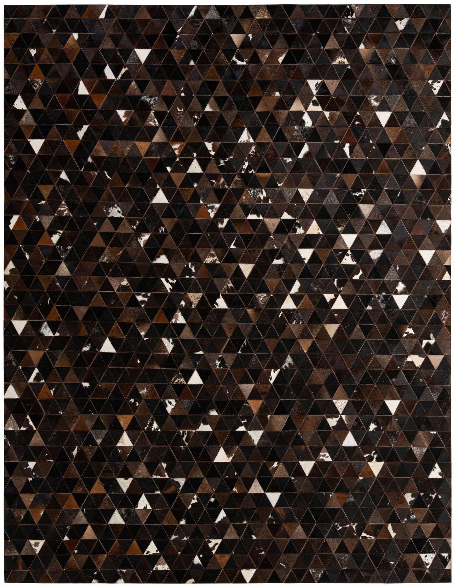 A rectangular 8x10 Cowhide Patchwork rug featuring a modern geometric pattern of brown, tan, black, and white triangular cowhide pieces.