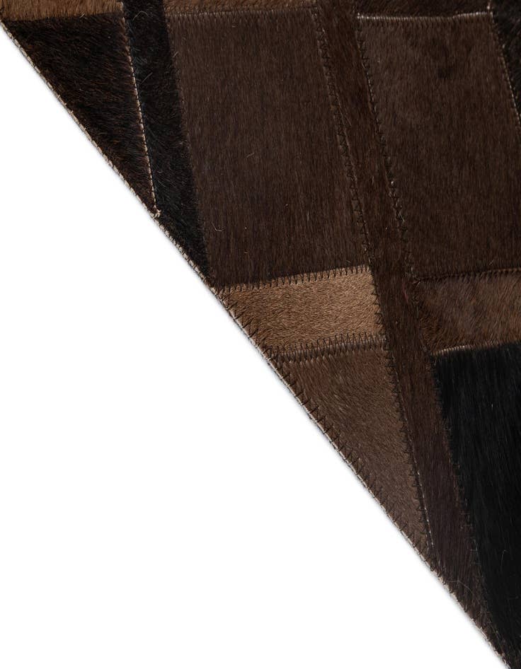 Detail image of  4' 11 x 8' 3 Cowhide - Patchwork Rug