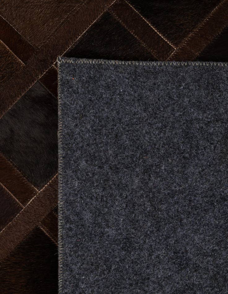 Detail image of  4' 11 x 8' 3 Cowhide - Patchwork Rug