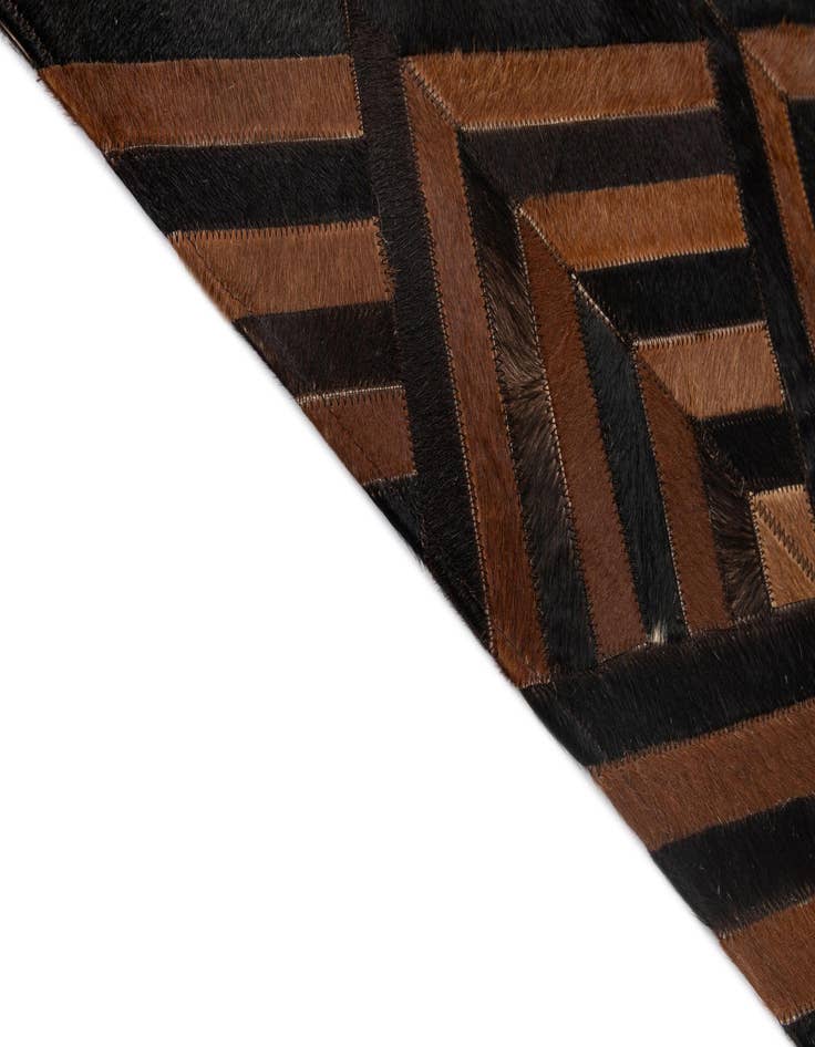 Detail image of  5' 1 x 7' 11 Cowhide - Patchwork Rug