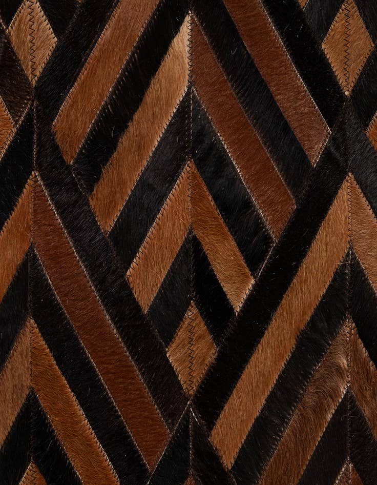 Detail image of  5' 1 x 7' 11 Cowhide - Patchwork Rug