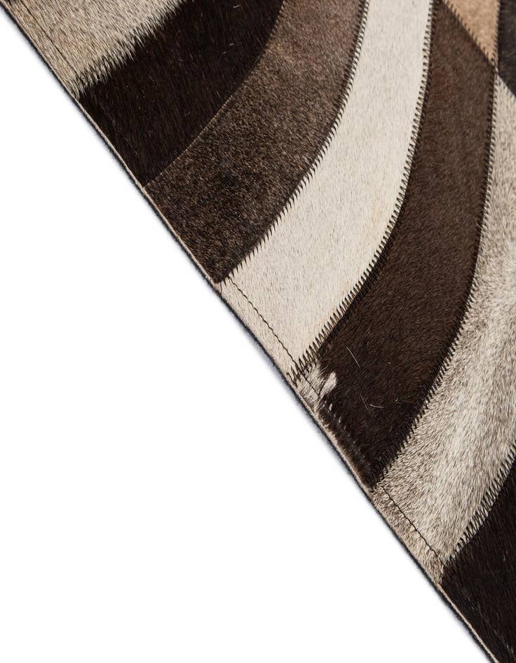 Detail image of  5' 1 x 7' 10 Cowhide - Patchwork Rug