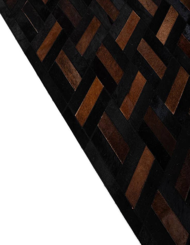 Detail image of  5' 1 x 8' 3 Cowhide - Patchwork Rug