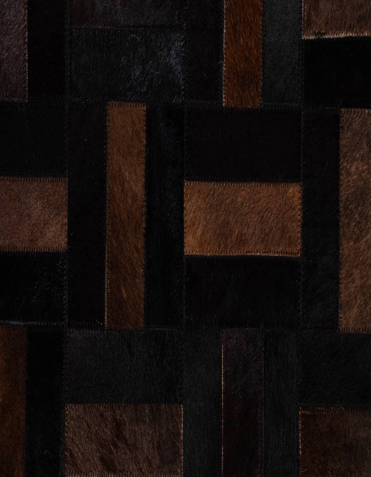 Detail image of  5' 1 x 8' 3 Cowhide - Patchwork Rug