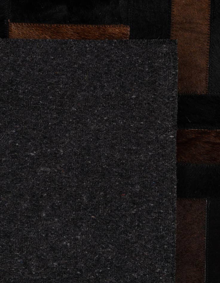 Detail image of  5' 3 x 8' 2 Cowhide - Patchwork Rug