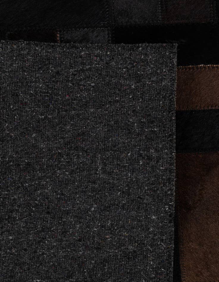 Detail image of  5' 3 x 8' 2 Cowhide - Patchwork Rug