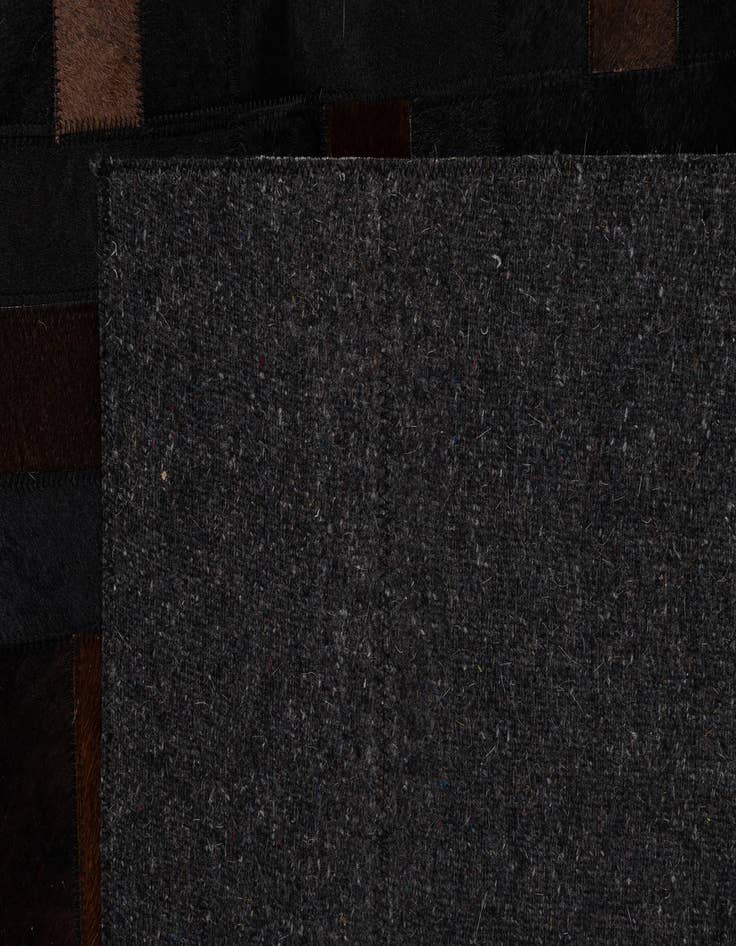 Detail image of  5' 1 x 8' 1 Cowhide - Patchwork Rug