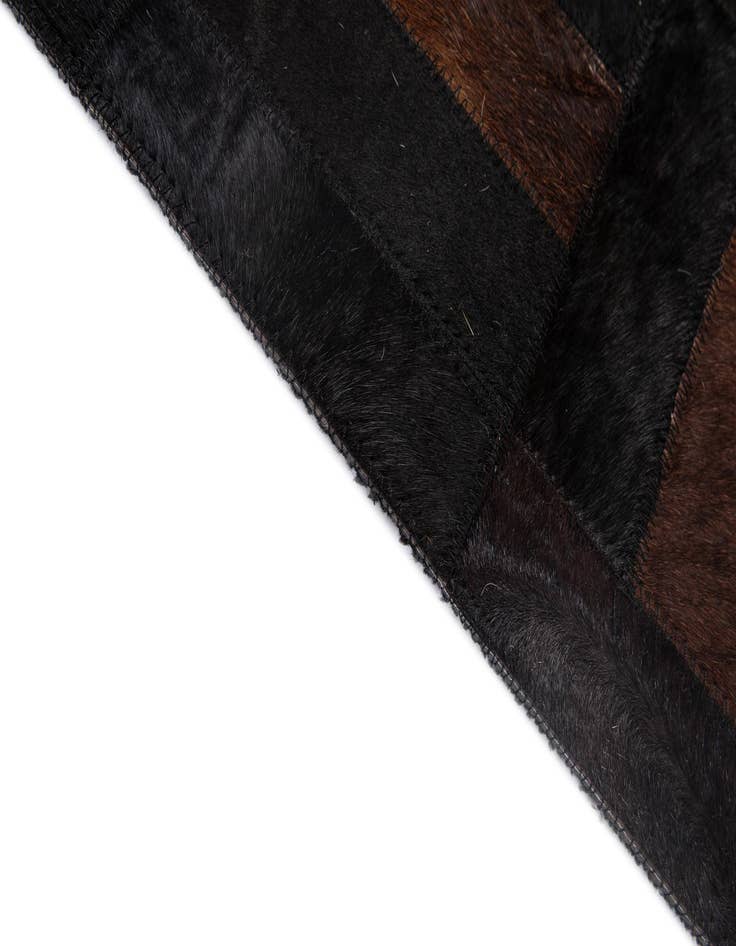 Detail image of  5' 3 x 8' 2 Cowhide - Patchwork Rug