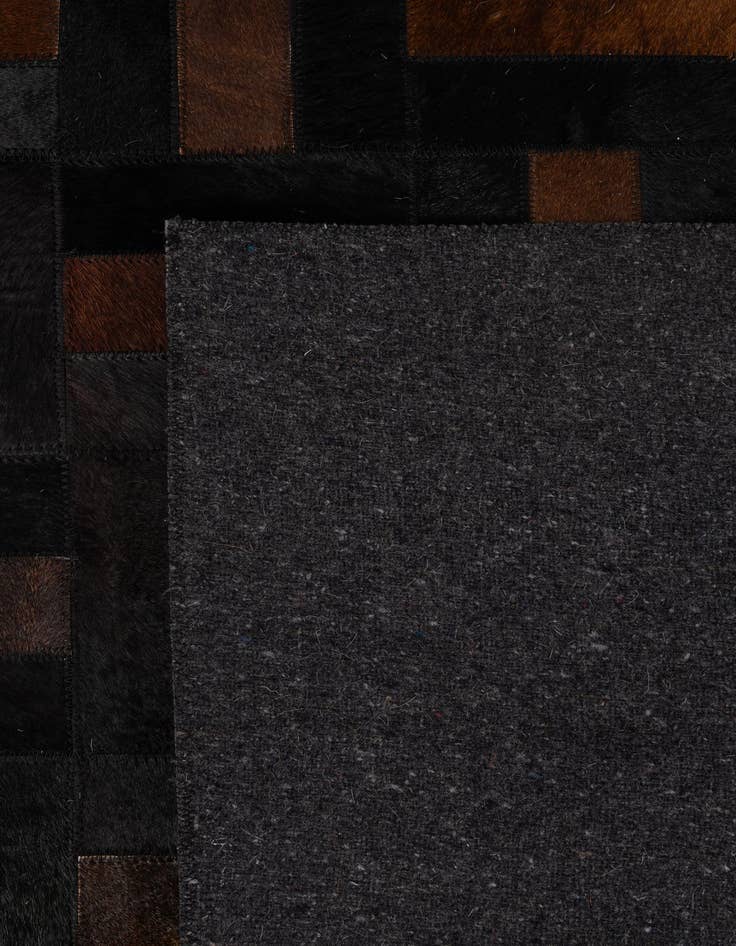 Detail image of  5' 3 x 8' 2 Cowhide - Patchwork Rug