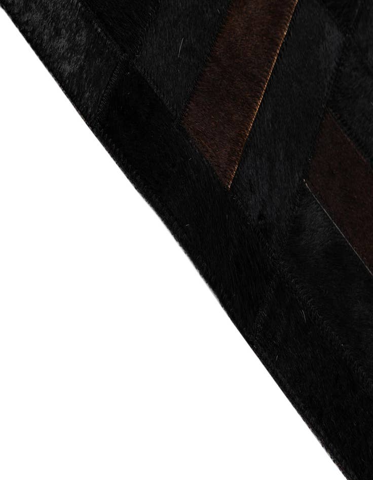 Detail image of  5' 3 x 8' 2 Cowhide - Patchwork Rug