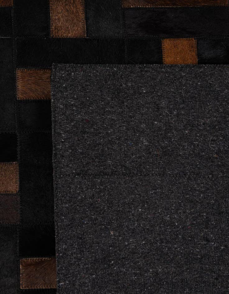 Detail image of  5' 3 x 8' 2 Cowhide - Patchwork Rug