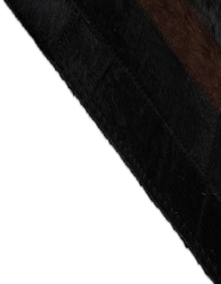 Detail image of  5' 2 x 8' 1 Cowhide - Patchwork Rug