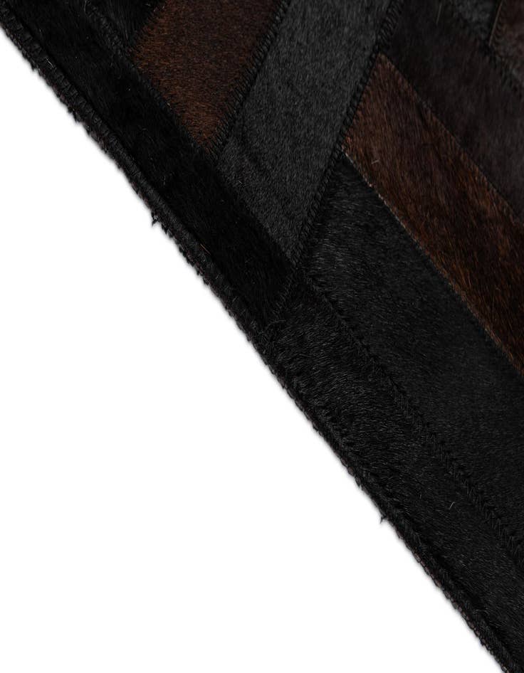 Detail image of  5' 3 x 8' 2 Cowhide - Patchwork Rug