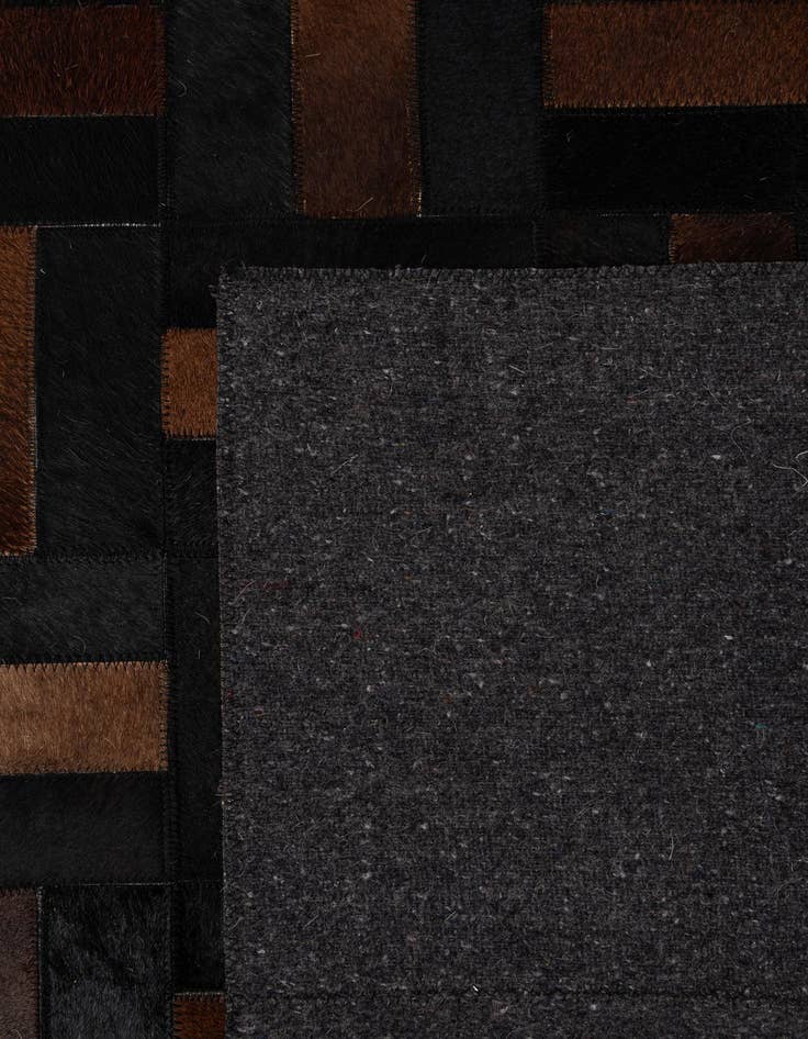 Detail image of  5' 3 x 8' 1 Cowhide - Patchwork Rug