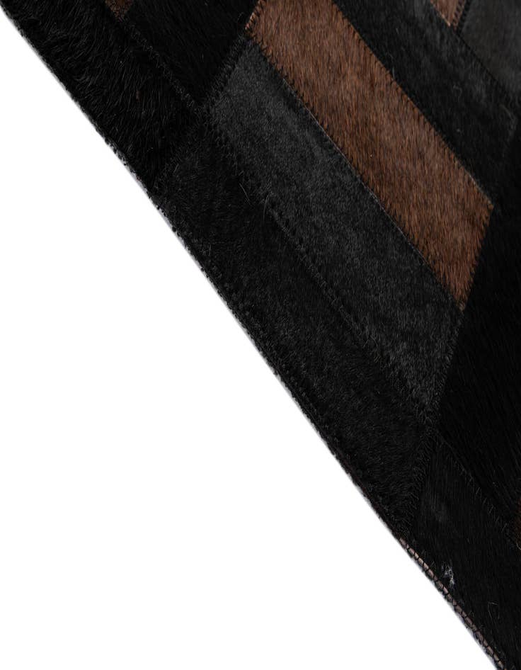 Detail image of  5' 2 x 8' Cowhide - Patchwork Rug