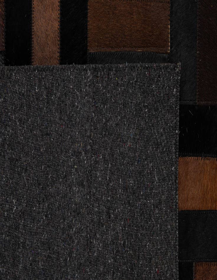 Detail image of  5' 2 x 8' Cowhide - Patchwork Rug