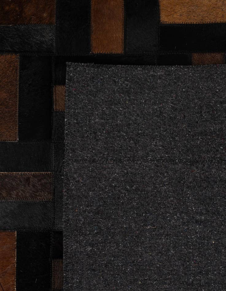 Detail image of  5' 3 x 8' 2 Cowhide - Patchwork Rug