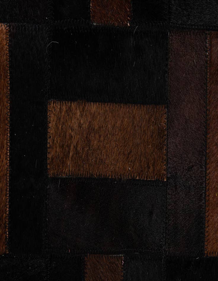 Detail image of  5' 3 x 8' 2 Cowhide - Patchwork Rug
