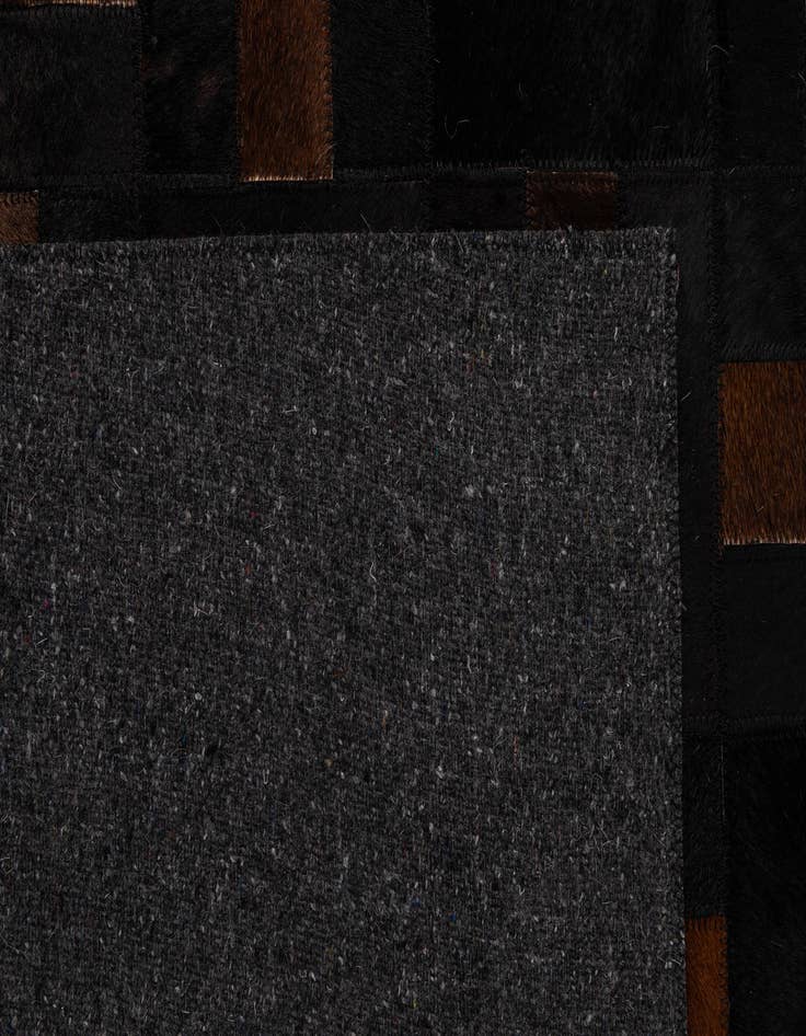 Detail image of  5' 3 x 8' 2 Cowhide - Patchwork Rug