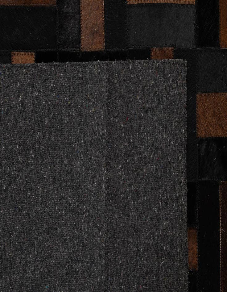 Detail image of  5' 3 x 8' Cowhide - Patchwork Rug