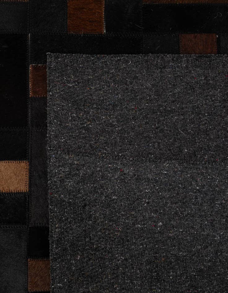 Detail image of  5' 3 x 8' 2 Cowhide - Patchwork Rug