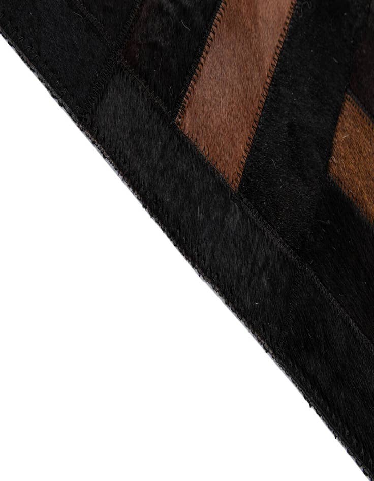 Detail image of  5' 3 x 8' 2 Cowhide - Patchwork Rug