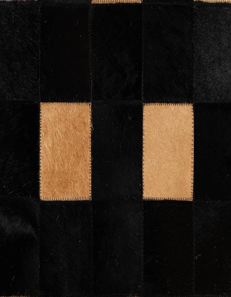 Detail image of  5' 1 x 7' 11 Cowhide - Patchwork Rug
