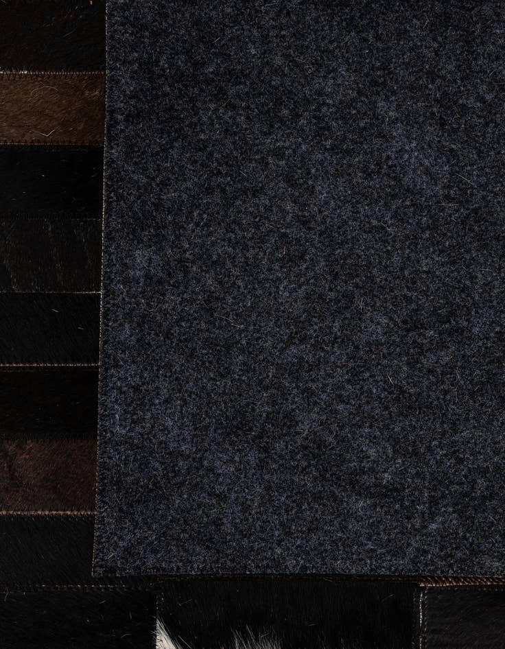 Detail image of  4' 11 x 8' Cowhide - Patchwork Rug