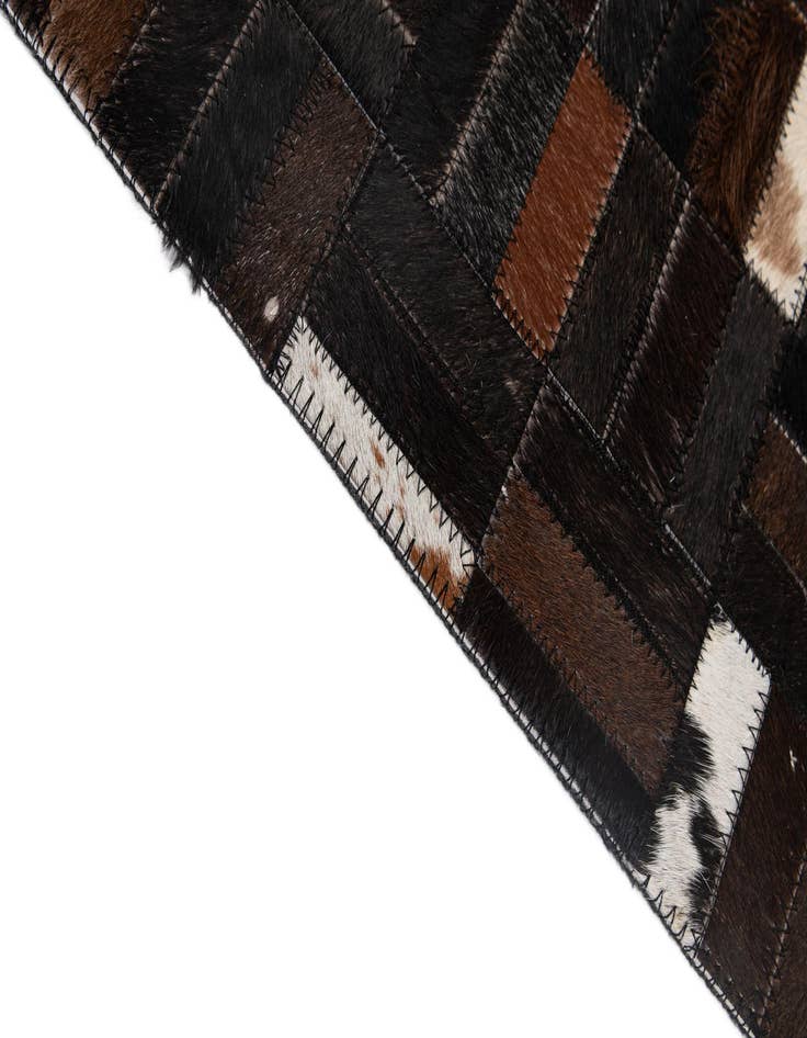 Detail image of  5' 1 x 8' Cowhide - Patchwork Rug