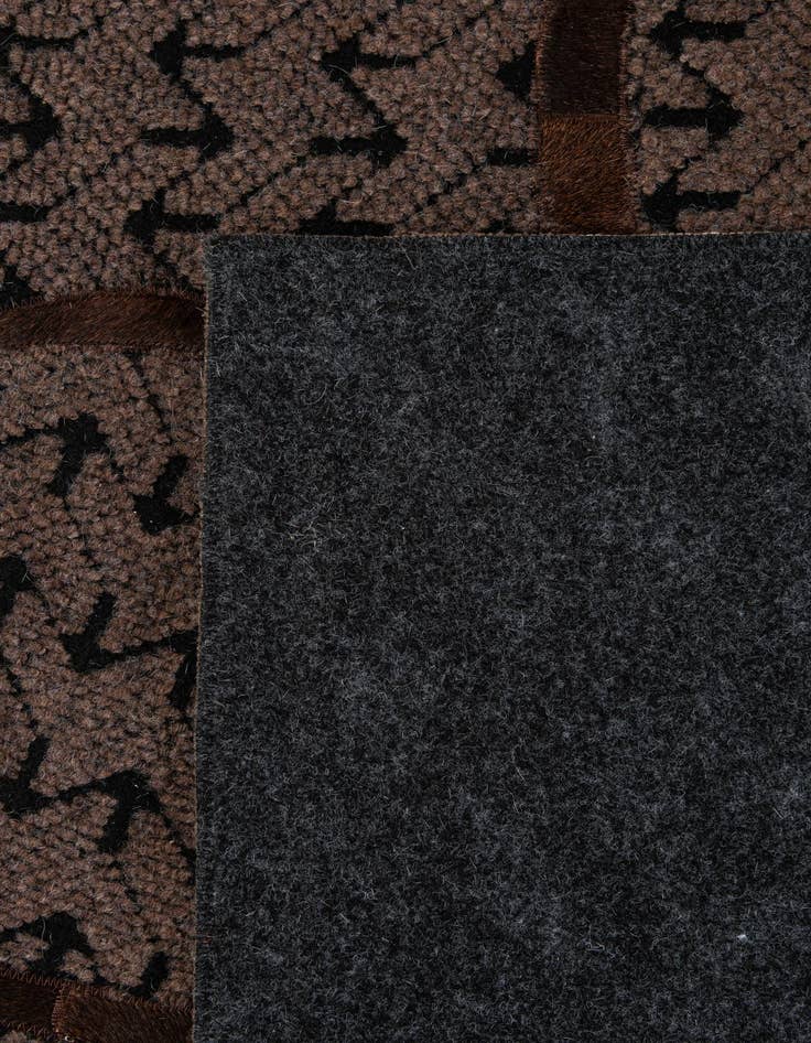 Detail image of  5' 1 x 7' 11 Cowhide - Patchwork Rug