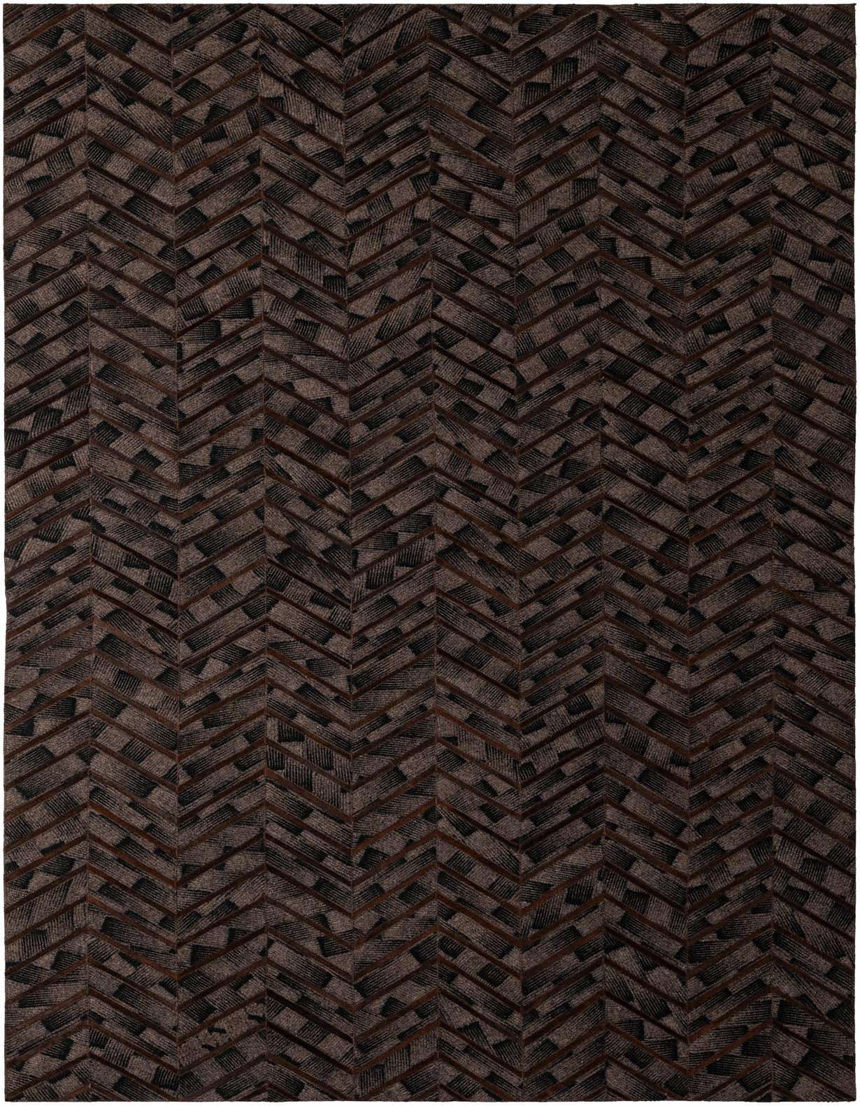 A 5x8 rectangular Cowhide - Patchwork rug featuring a modern chevron pattern in varying shades of brown and tan, with dark leather accents.