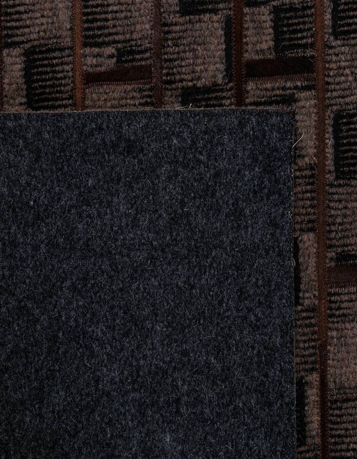 Detail image of  5' 1 x 7' 8 Cowhide - Patchwork Rug