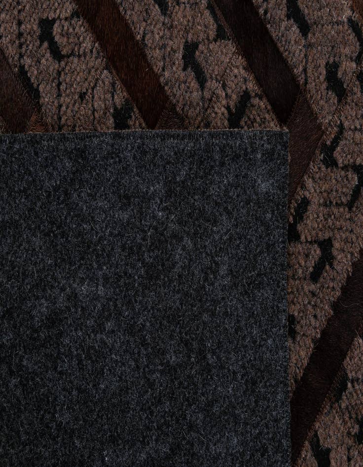 Detail image of  4' 11 x 7' 11 Cowhide - Patchwork Rug
