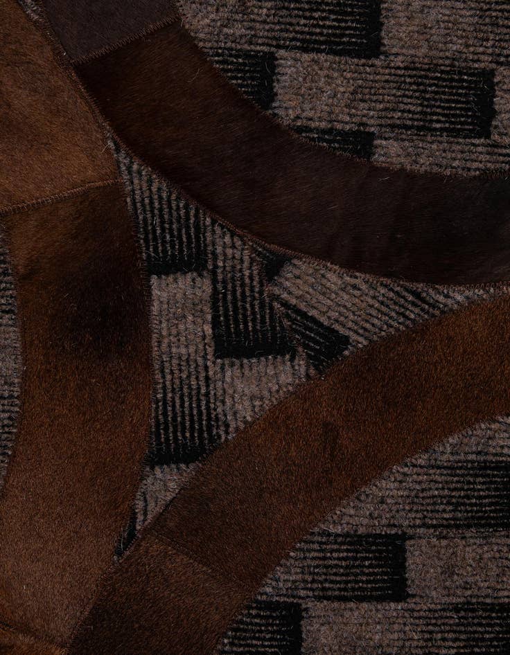 Detail image of  5' 1 x 7' 11 Cowhide - Patchwork Rug