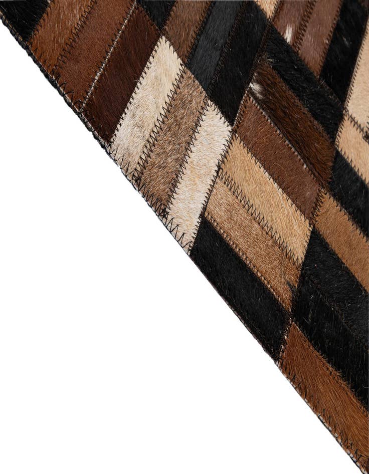 Detail image of  4' 11 x 7' 11 Cowhide - Patchwork Rug