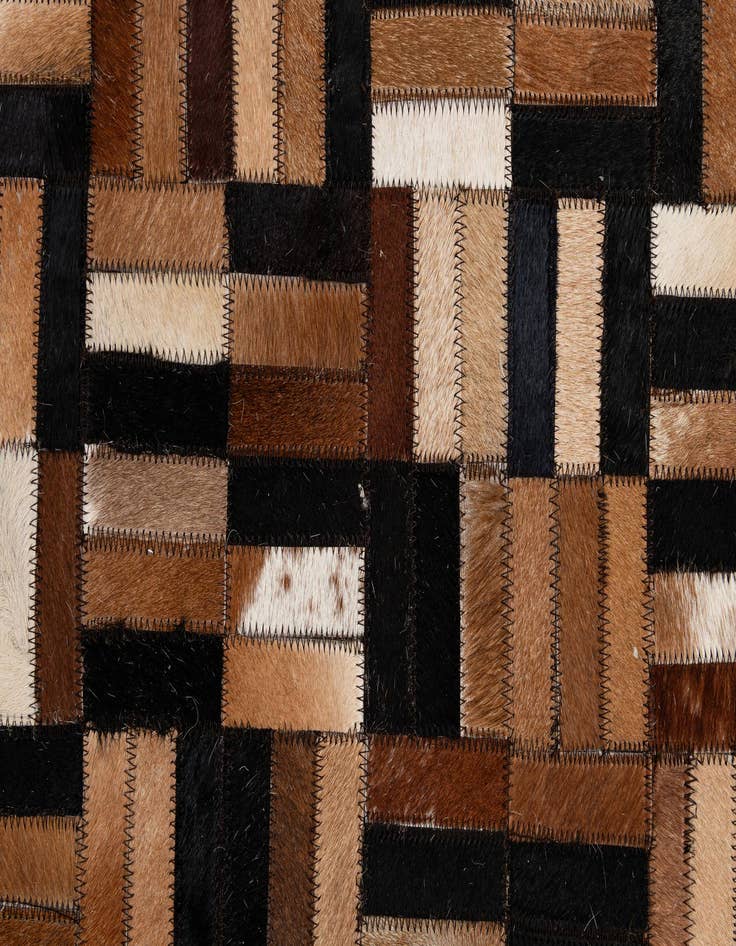 Detail image of  4' 11 x 7' 11 Cowhide - Patchwork Rug