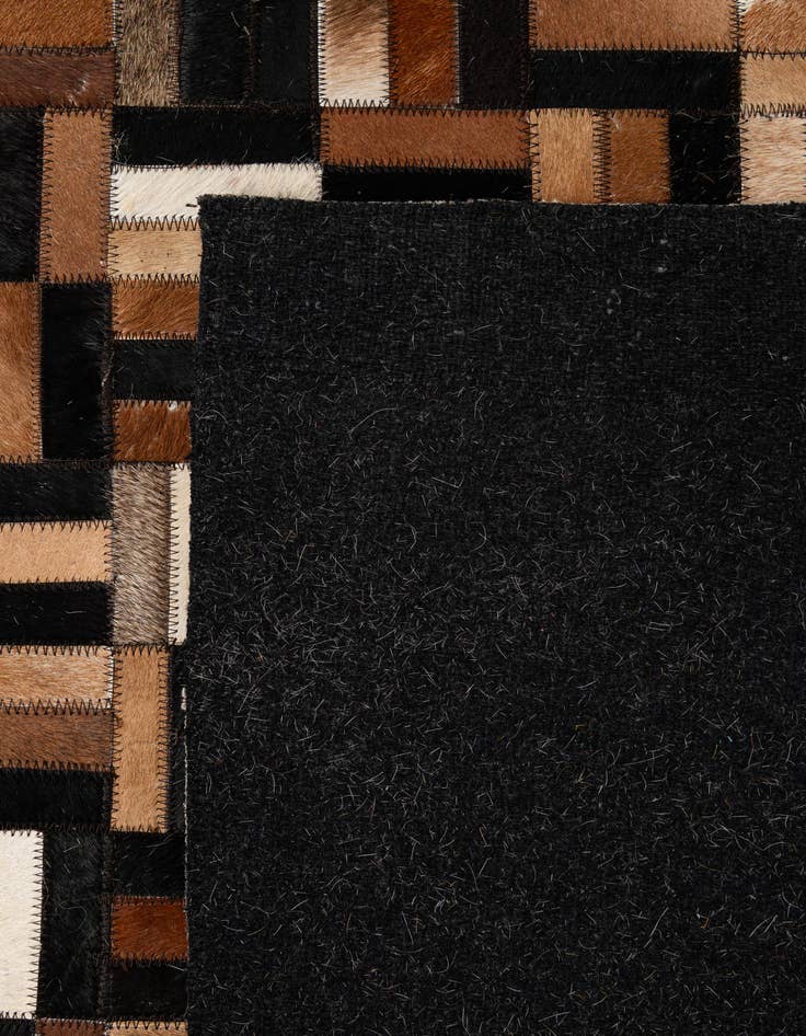 Detail image of  4' 11 x 7' 11 Cowhide - Patchwork Rug